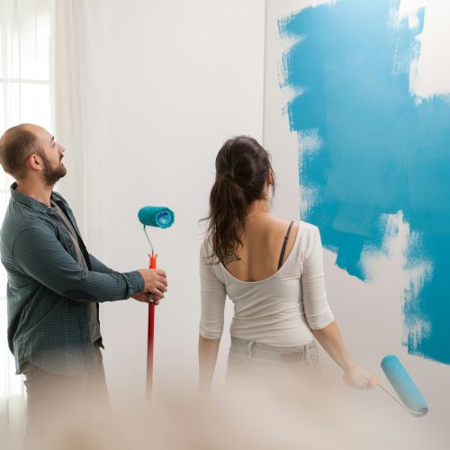 Checking the painted wall