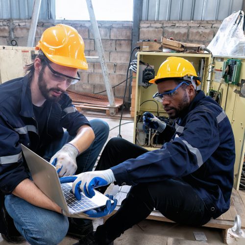 In robotic repair shop engineer troubleshoot repair electrical controller reference online manual