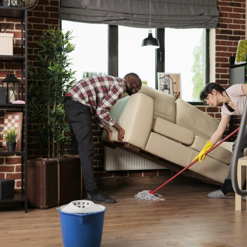 Married couple doing spring cleaning
